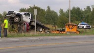 Audi driver hospitalized after collision with asphalt truck in Jamestown Township