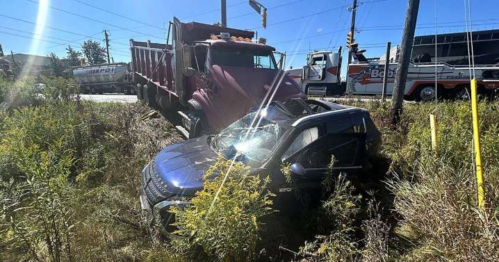 SUV driver charged after vehicle crushed by dump truck
