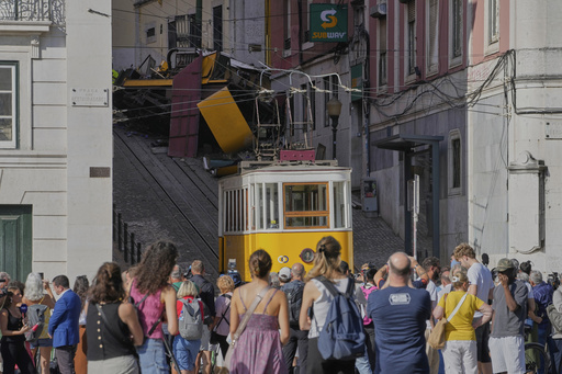 Portuguese investigators search for cause of Lisbon streetcar crash that killed 16