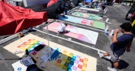 Orlando restaurateur uses parking spots as colorful protest against state's crackdown on rainbow crosswalks