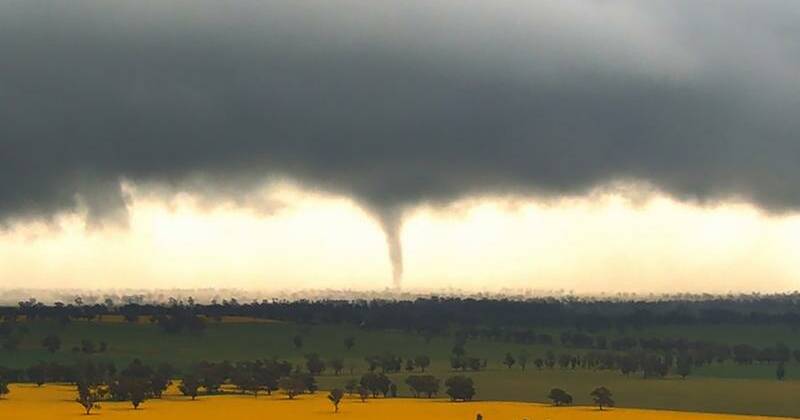 Tornado appears during heavy rain and wild winds