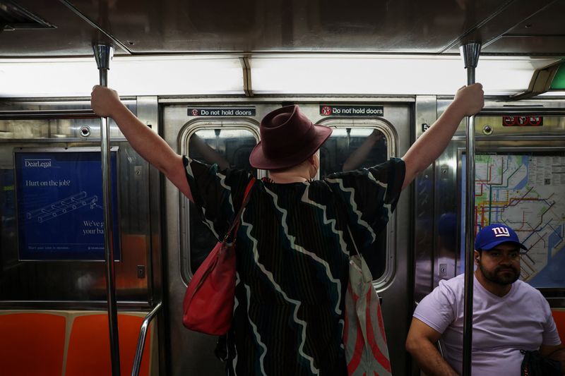 US threatens to withhold funds from Boston, Chicago transit agencies