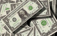 Toca peso-dólar otro mínimo por tensión en la Fed