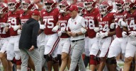 Michigan visits Oklahoma in matchup of storied programs