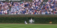 Owen Caissie in concussion protocol after catch at Wrigley Field