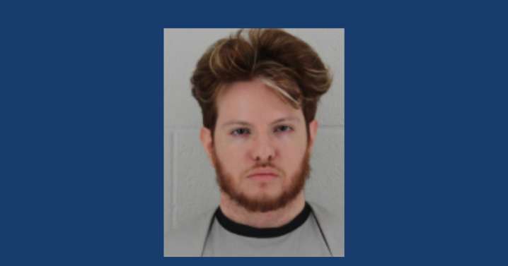 Man who fled United States after being charged with murder back in Johnson County Jail cell
