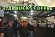 Starbucks to close hundreds of stores, lay off 900 workers