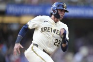 Brewers, Yelich scratched with back issue before Phillies game, not expected out long