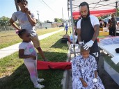 Photo Gallery: Sneaker and backpack giveaway at Nelson Grace Park