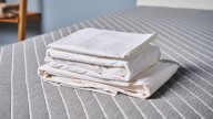 Forget silk — this crisp percale sheet set made me feel like I was sleeping in a luxury hotel bed and it costs a fraction of the price