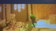 Wedding crashers seen stealing box of money