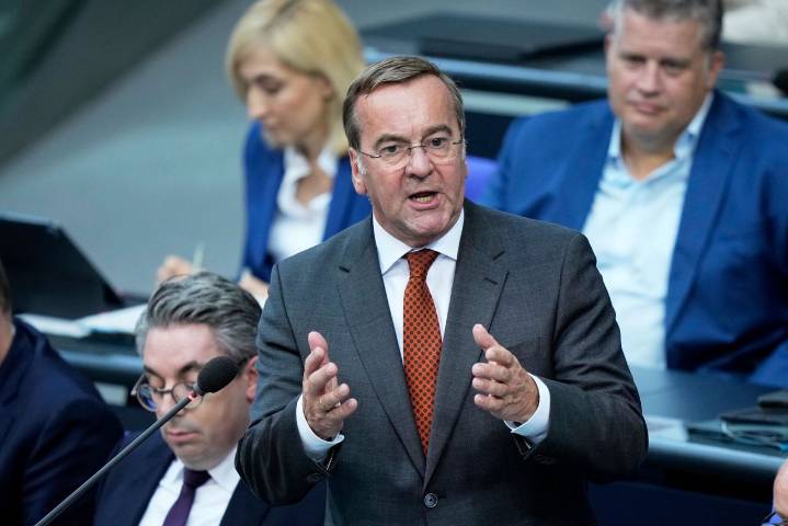 German defense minister says Russia is tracking two satellites used by the German military