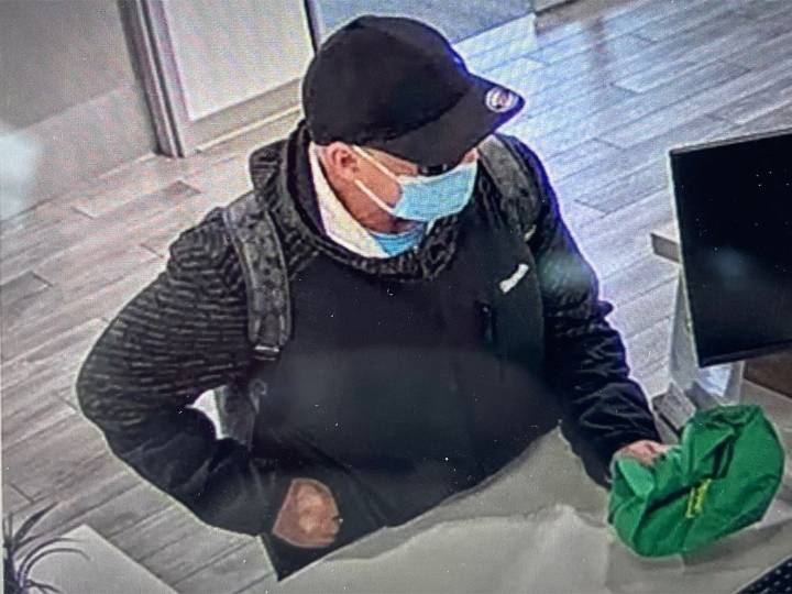 Airdrie RCMP seek bank robbery suspect who threatened to shoot clerk