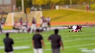 High school football player injured in body slam attends game in wheelchair