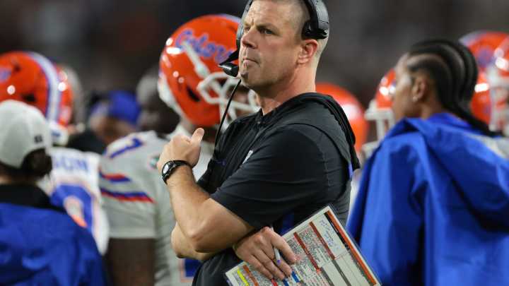 Florida football coach Billy Napier defends choice to maintain play calling duties.