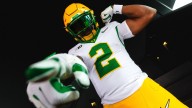 See photos of Oregon football's uniforms against…