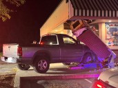 Pickup truck crashes into convenience store in Hampstead