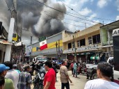 Mujer da su vida para salvar a su hija en un incendio de una tienda departamental