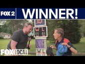 Livonia man has Tigers, Lions scoreboard in front yard