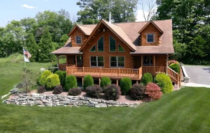 This family bought another lot to keep the stunning views. Now the $900K log home is for sale.