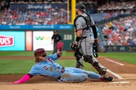 Phillies beat Miami 1-0, eliminating the Marlins from the wild