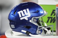 Koch family agrees to buy a 10% stake in the NFL's New York Giants, AP source says