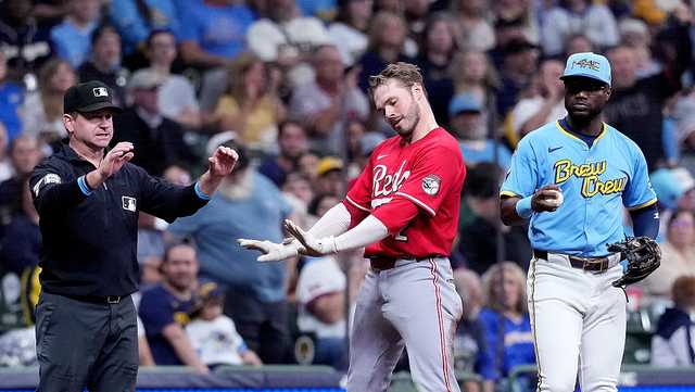 Reds take control of playoff spot with 3-1 win over Brewers, Mets’ loss