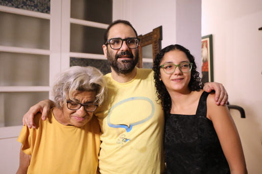 Family reunites as activist Alaa Abd el-Fattah returns home after 12 years in prison