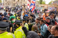 Migrant hotel protester arrested for ‘indecent exposure’ amid dissent across country