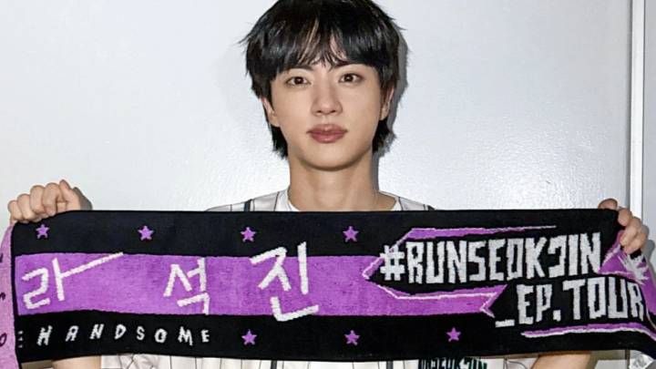 Watch: BTS’ Jin lands in Italy for Milan Fashion Week, fans create purple ribbon barric...