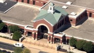 Suspect flees suburban courthouse, sparking large police response