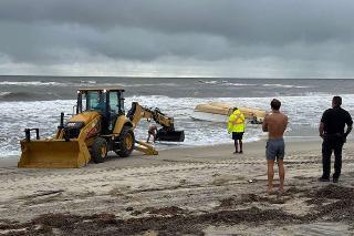 The Outer Banks Voice -   Boat believed to have sunk last week washes ashore in Nags Head