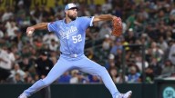 Wacha throws 6 shutout innings for his 10th win as Royals top Athletics 4