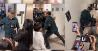 Habrían reanudado labores de oficial de ICE visto en video empujando a una mujer al suelo durante arresto a su pareja en tribunales, según fuentes