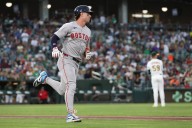 Red Sox infielder day-to-day with knee injury after leaving game following HR, double