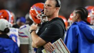 Florida football coach Billy Napier defends choice to maintain play calling duties.