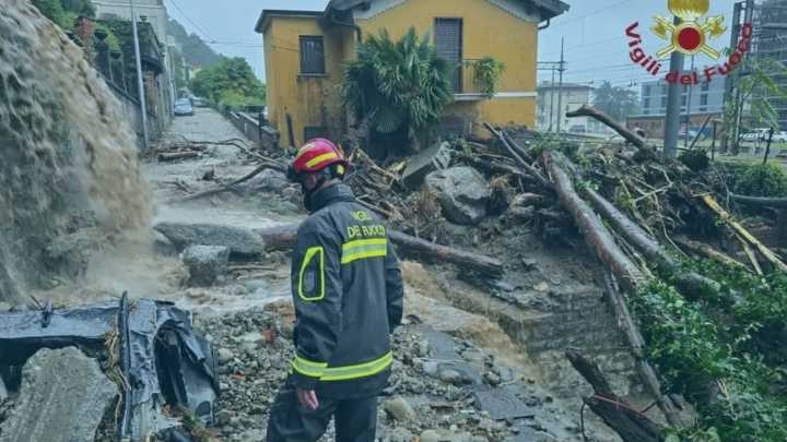 Italy smashed by brutal floods turning railway lines into rivers & submerging villages as choppers rescue trapped locals