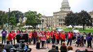 Education unions rally in Lansing as state government shutdown angst grows