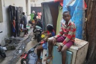 Official says gangs killed dozens in small fishing village in Haiti’s latest massacre