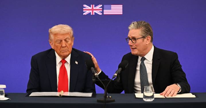 Hunched-Over Donald Trump, 79, Tries to Hide Bruised Hands Under Desk