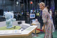 Duchess of Edinburgh interacts with robot dog during Japan visit