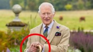 King Charles appears to wear late Prince Philip’s signet ring in new portrait unveiled in Scottish Parliament