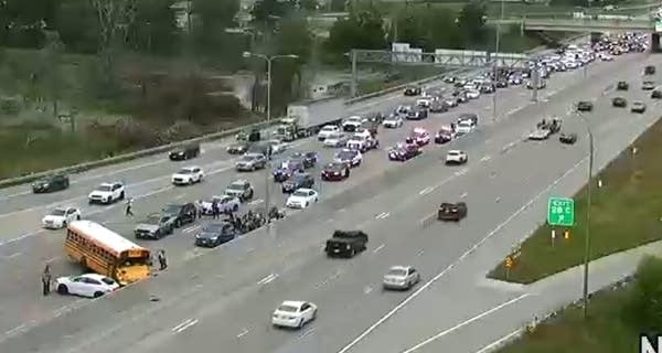 Crash involving school bus snarls traffic on I