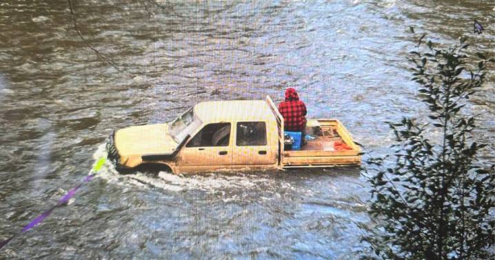 Man rescued from ute tray after car enters Arthur River