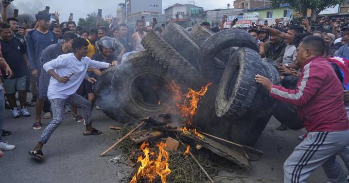 Nepal political leaders' homes set on fire as protests over retracted social media ban grow