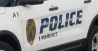 Lawrence police arrest woman for allegedly stealing city bus