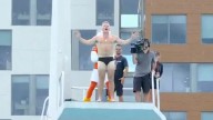 Pat McAfee jumps from high-dive in Speedo during stunning live TV moment after making final pick on College GameDay