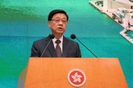 Hong Kong leader focuses on boosting economy, livelihoods