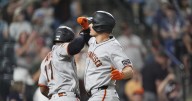 Chapman homers twice after appealing suspension to help the Giants beat the Rockies