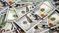 Leve suba del dólar oficial al promediar la rueda